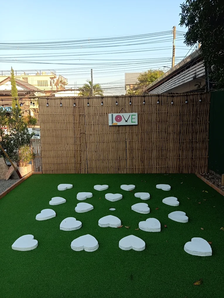 A playful heart-shaped mini golf green